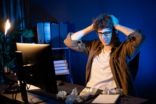 A developer looking frustrated at a messy code editor