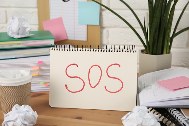A person looking overwhelmed at a long to-do list on a computer screen
